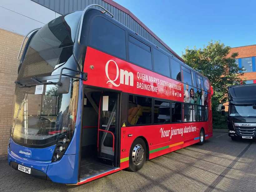 Qm double-decker bus wrap