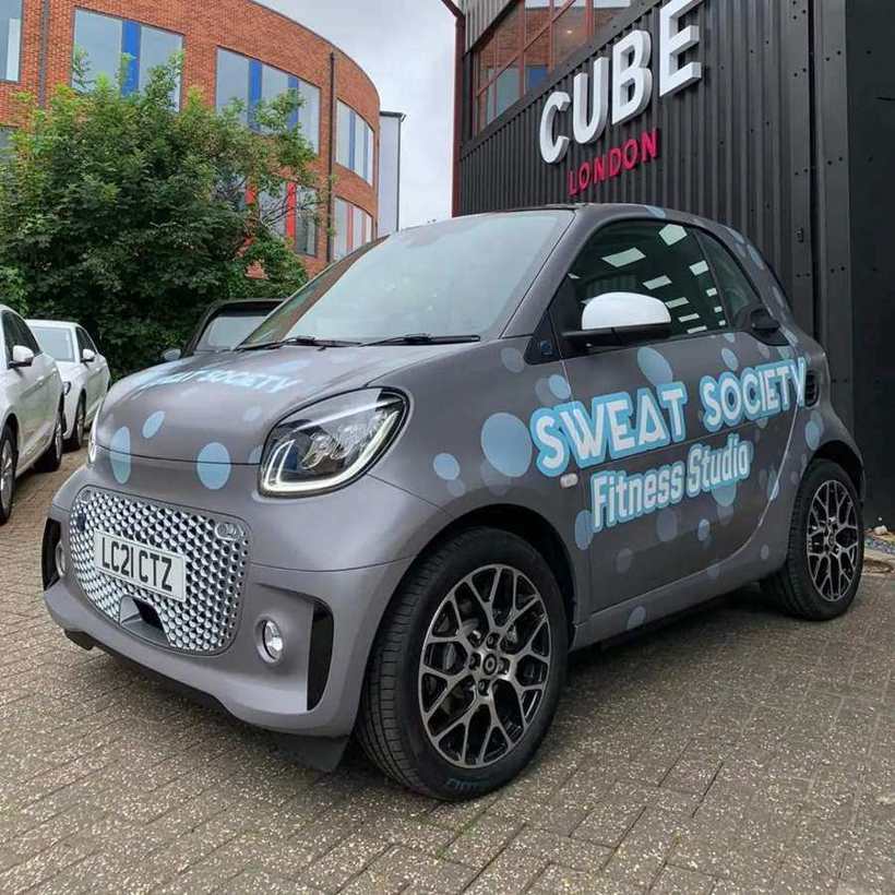 Smart car branded wrap for Sweat Society