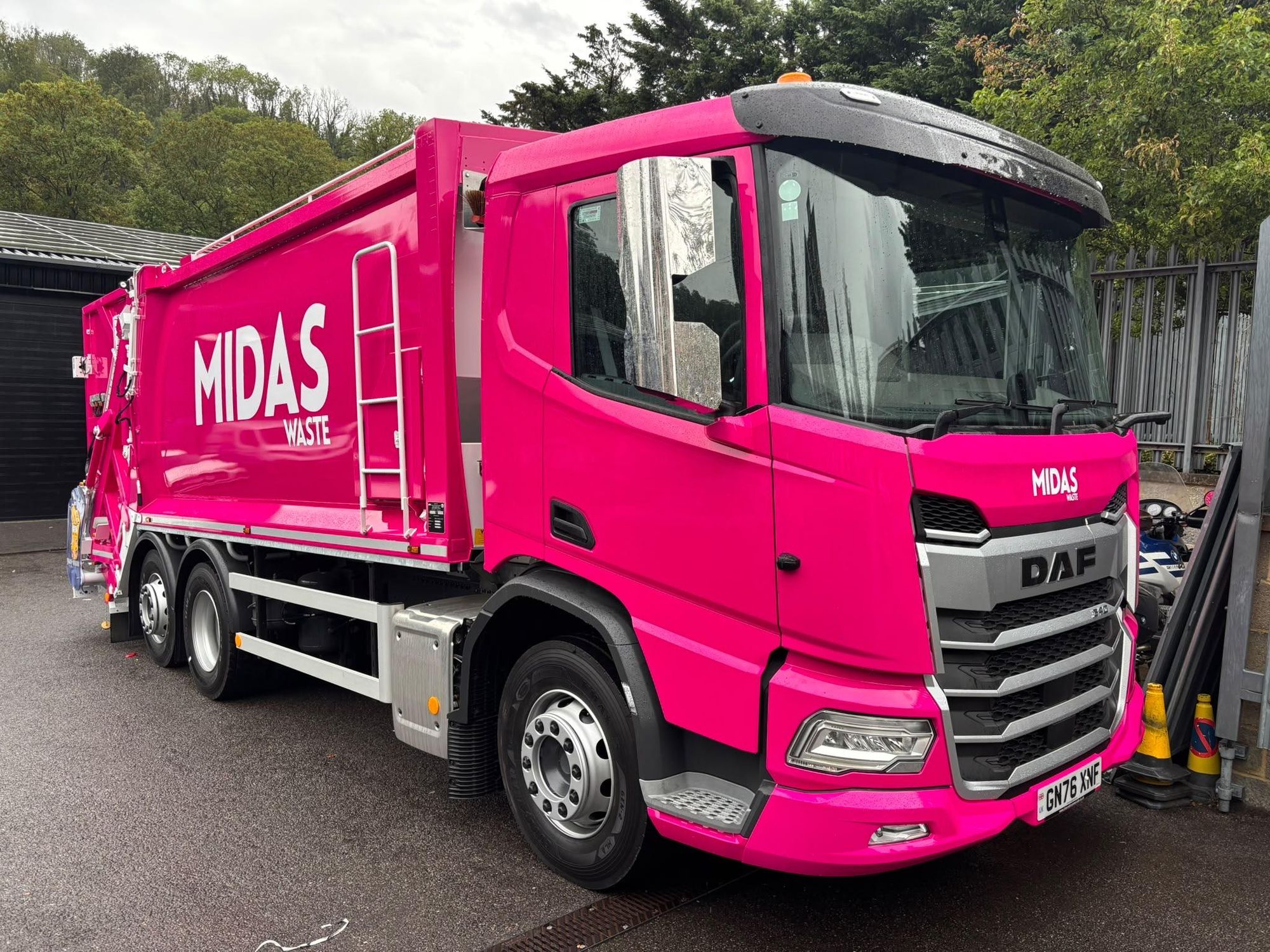 Midas Waste DAF refuse truck wrapped in pink