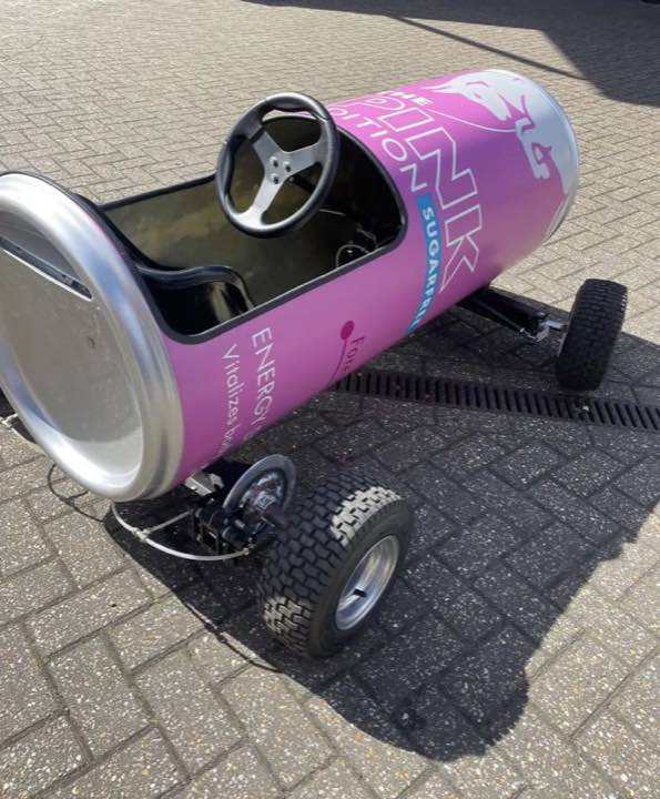 Red Bull can-shaped promotional vehicle wrap