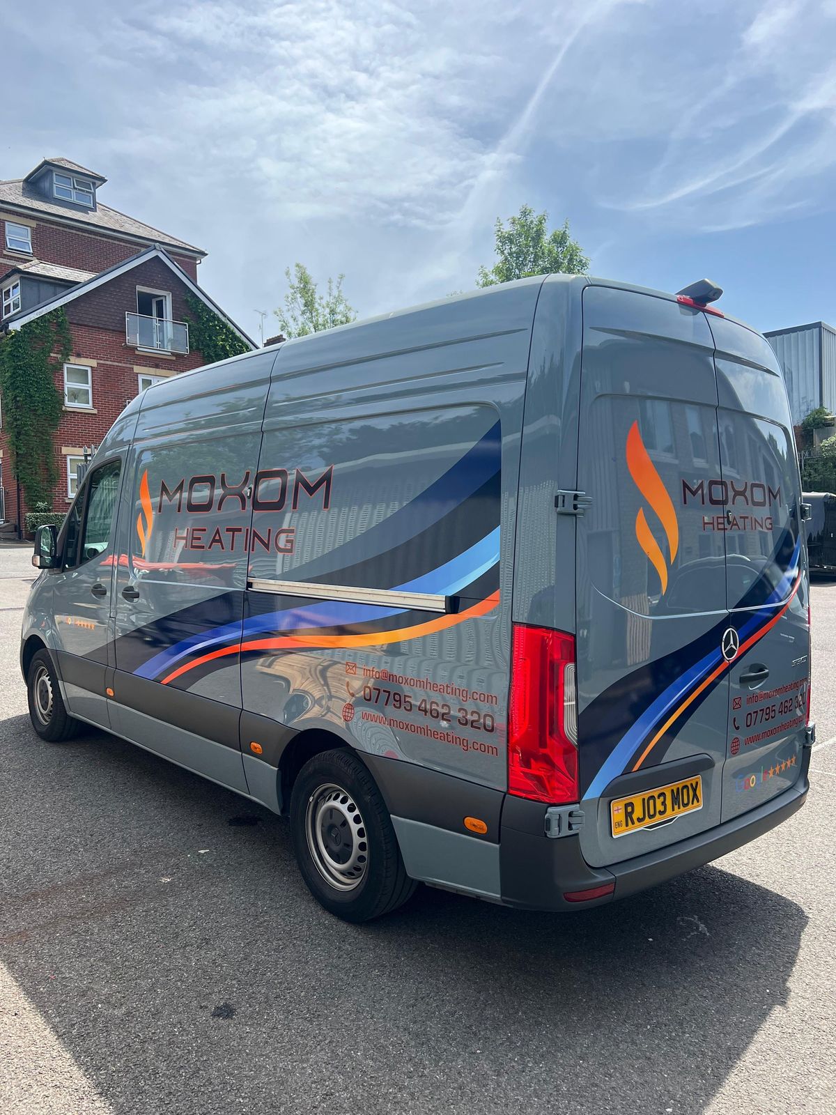 Moxom Heating Sprinter van wrap from the rear